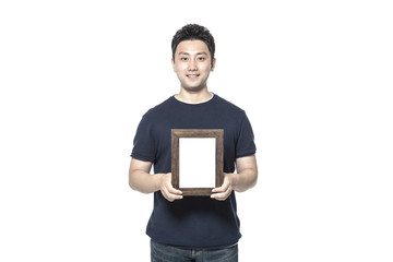 asian man hand hold a photo frame isolated white.