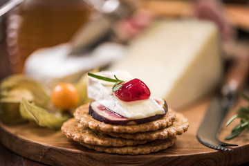 Cheese crackers with camembert,cranberry,fig and herb