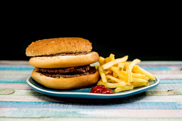 Cheese burger - American cheese burger with Golden French fries