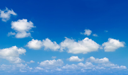 Naklejka na ściany i meble The blue sky alternates with a white cloud.Can be made to the background image.