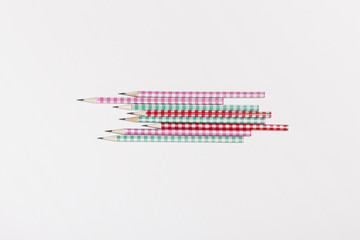 colorful pencils on the white background.
