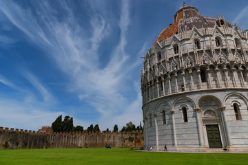 Magnificent daily view at the Pisa Baptistery of St. John, the largest baptistery in Italy, in the Square of Miracles (Piazza dei Miracoli), Pisa, Italy.