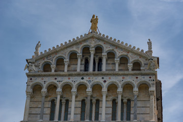 Fototapeta na wymiar Details of the exterior of the Pisa Cathedral (Cattedrale Metropolitana Primaziale di Santa Maria Assunta; Duomo di Pisa in italian), Pisa, Tuscany, Italy