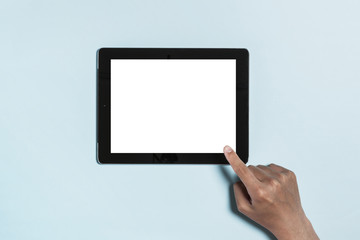 digital device with stationary on the blue background.