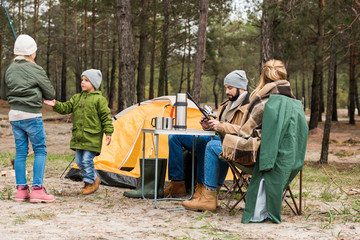 family on camping in forest