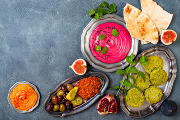 Middle Eastern traditional dinner. Authentic arab cuisine. Meze party food. Top view, flat lay,...