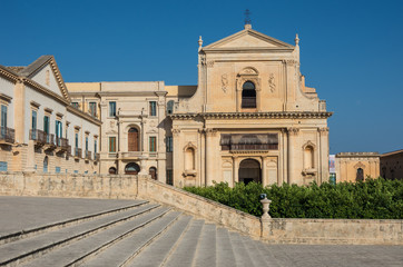 Fototapeta na wymiar Basilica of saint savior (san salvatore) in Noto. View from stairway of cathedral of Noto. Sicily Italy