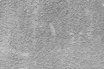 Wall fragment with scratches and cracks