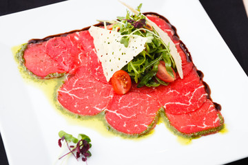 Beef carpaccio with salad