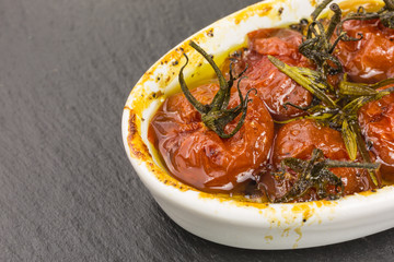 appetizer of cherry tomatoes baked in olive oil and sugar