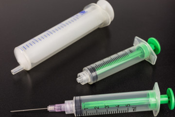 plastic syringe with hypodermic needle