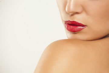 Obraz na płótnie Canvas beautiful lips with red lipstick
