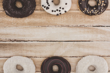 donuts on wooden table top