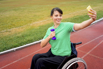 Disabled girl on a stadium