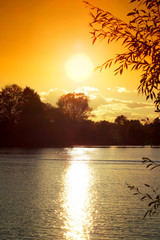 Beautiful orange sunset on the river