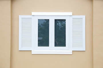 Picturesque window on wall of house. Italy home style