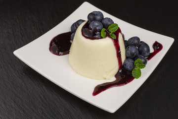 panna cotta with blueberries and mint