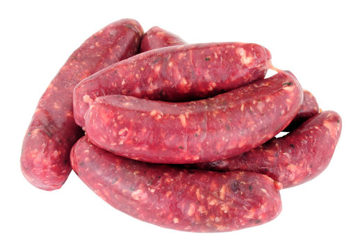 Raw venison meat sausages isolated on a white background