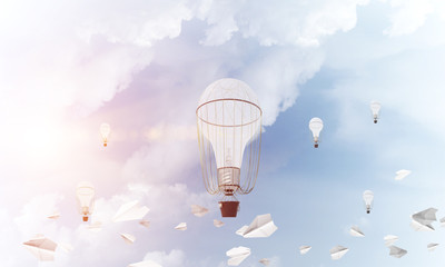 Flying hot air balloons in the air.
