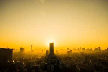 Naklejka premium Sunset city view yellow sky