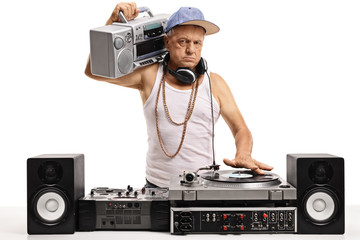 Angry elderly DJ with a boombox