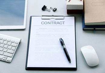 CONTRACT paper on the table businessman