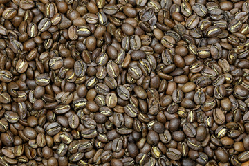 manufacture roasted Indonesian Java Arabica coffee beans (variety Blawan Estate) for background use