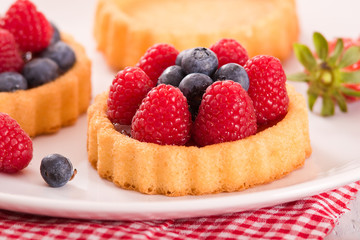 Tartlets with forest fruits. 
