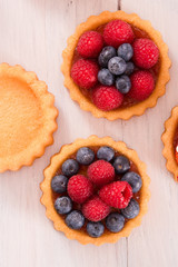 Tartlets with forest fruits. 