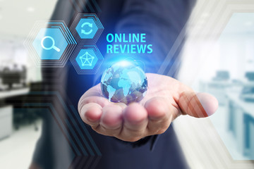 The concept of business, technology, the Internet and the network. A young entrepreneur working on a virtual screen of the future and sees the inscription: Online reviews
