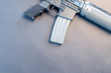 Metal weapon on black background