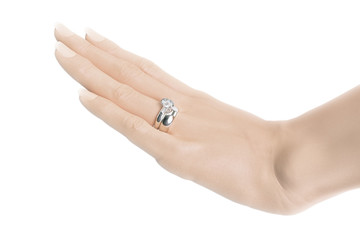 Woman's left hand with platin wedding ring