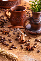 Obraz na płótnie Canvas grains of black coffee on the wooden table