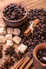 grains of black coffee on the wooden table