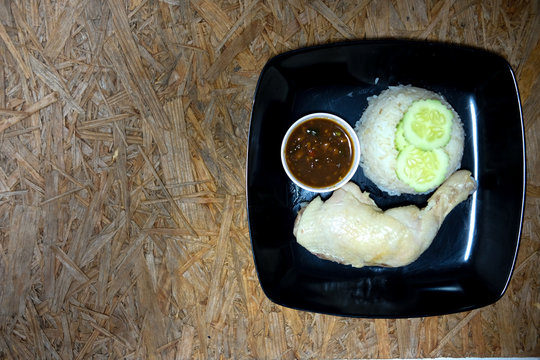 Rice steamed with chicken (hainanese chicken rice)