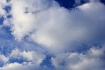 Clouds in the blue sky. Background, texture.