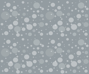 Christmas snowfall on the background of grey sky