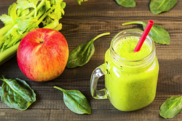 spinach smoothie in jar glass