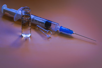 syringe and ampoule