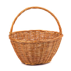 Empty wicker basket for fruits and vegetables, isolated on white.