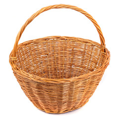 Empty wicker basket for fruits and vegetables, isolated on white.