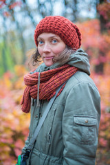 Portrait of charming woman, in the knitted scarf