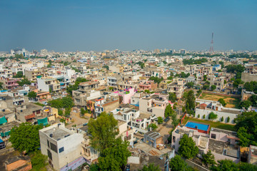 Fototapeta na wymiar Beautiful aerial view of old colorful buildings city in Rajasthan state, in India