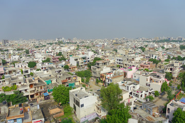 Fototapeta na wymiar Beautiful aerial view of old colorful buildings city in Rajasthan state, in India