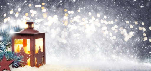 Red Lantern on the Christmas tree in the snow