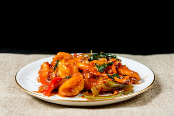 wok fried Shrimp stir fry with sweet peppers and chinese vegetables