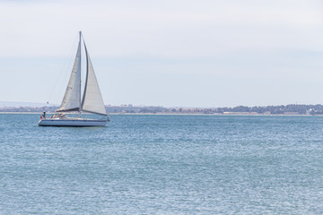 Fototapeta premium Sailboat in Tejo River, Lisboa