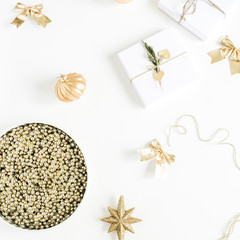 Christmas gifts and baubles on white background. Flat lay, top view New Year composition.