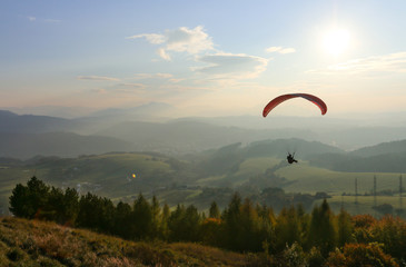 Paragliding in sunset