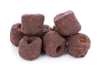 Crunchy corn chocolate snacks on a white background